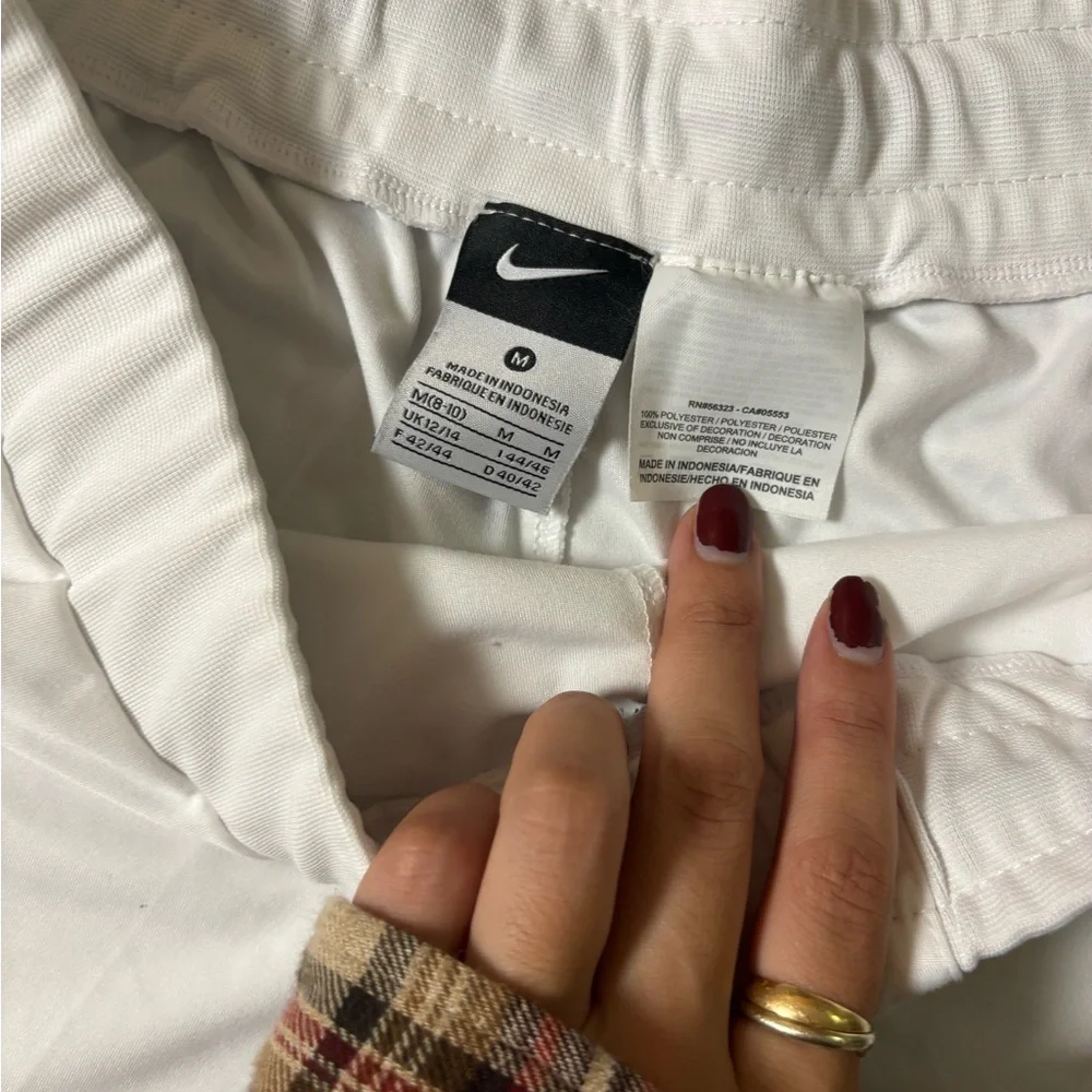 White and navy Nike shorts with drawstring size M